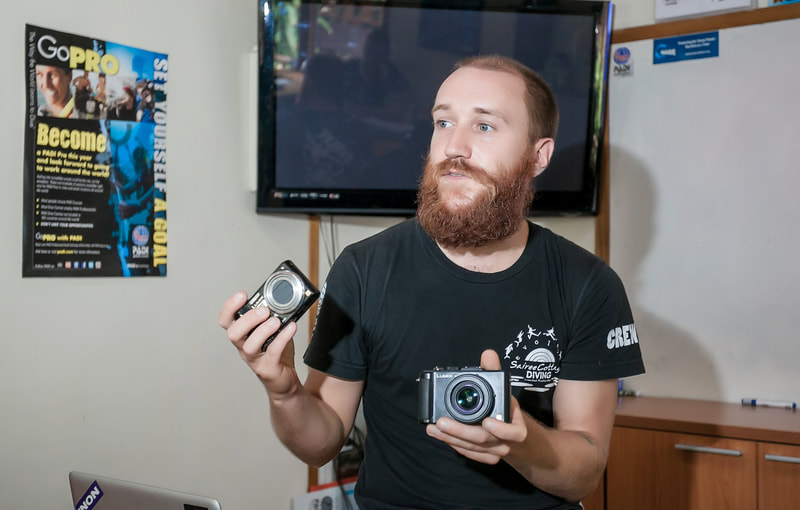 Paddy Peach Steele giving compact camera advice