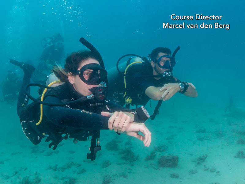 Stay close to your buddy while scuba diving PADI Open Water Diver Manual Answers Chapter 2