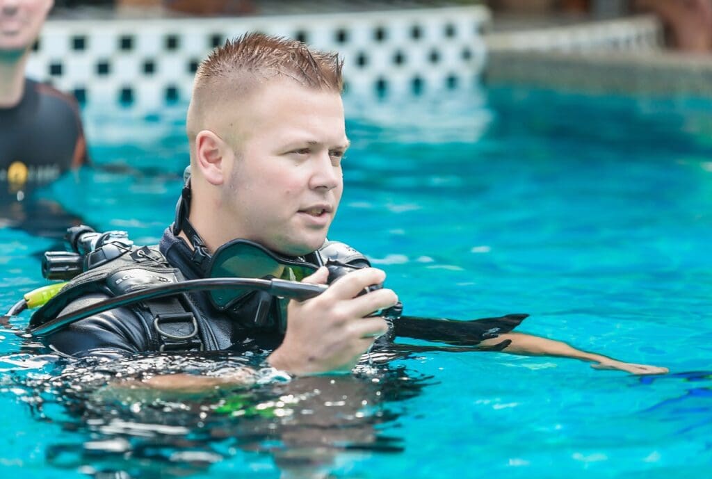 Learning to hover using oral inflation builds essential emergency skills—helping divers stay neutrally buoyant even if the power inflator fails
