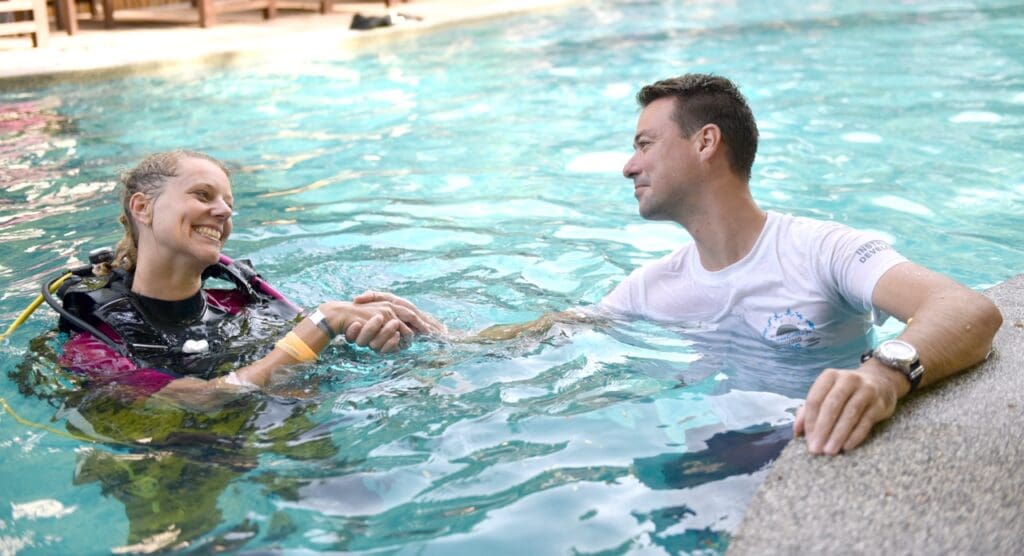 PADI Course Director supporting an Instructor candidate during IDC training on Koh Tao